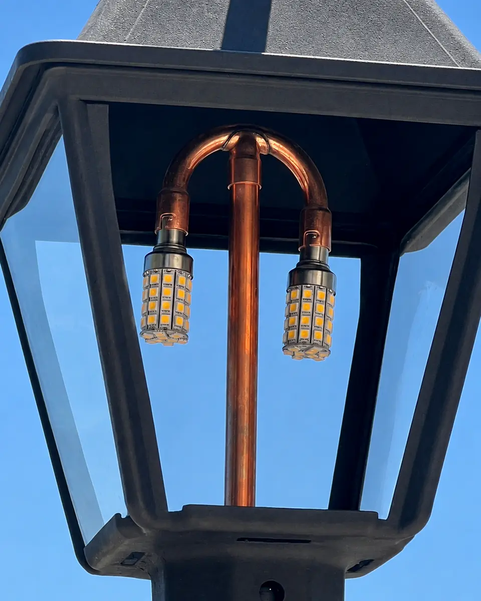Low-voltage LED conversion inside a traditional outdoor lamp fixture